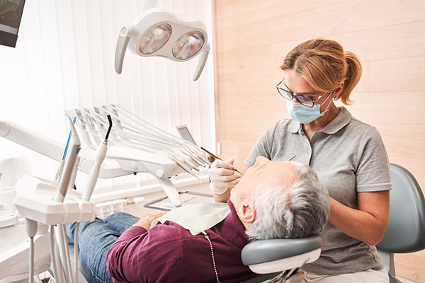 Looking For Cavities At A Dental Checkup